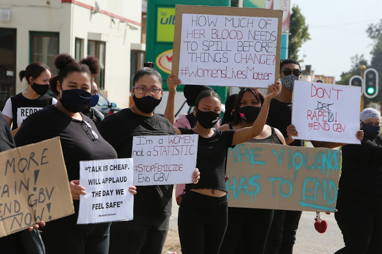 About 50 people held a protest in Standford Road to take a public stand against gender-based violence on Saturday.