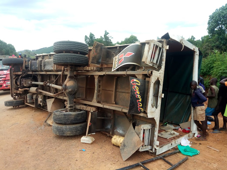 A lorry that overturned following an accident at Chabera along the Kisumu-Kisii road on Thursday November 28, 2019