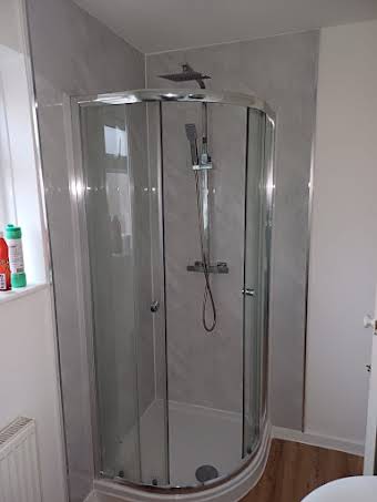 Shower unit installation and wall panelling  album cover