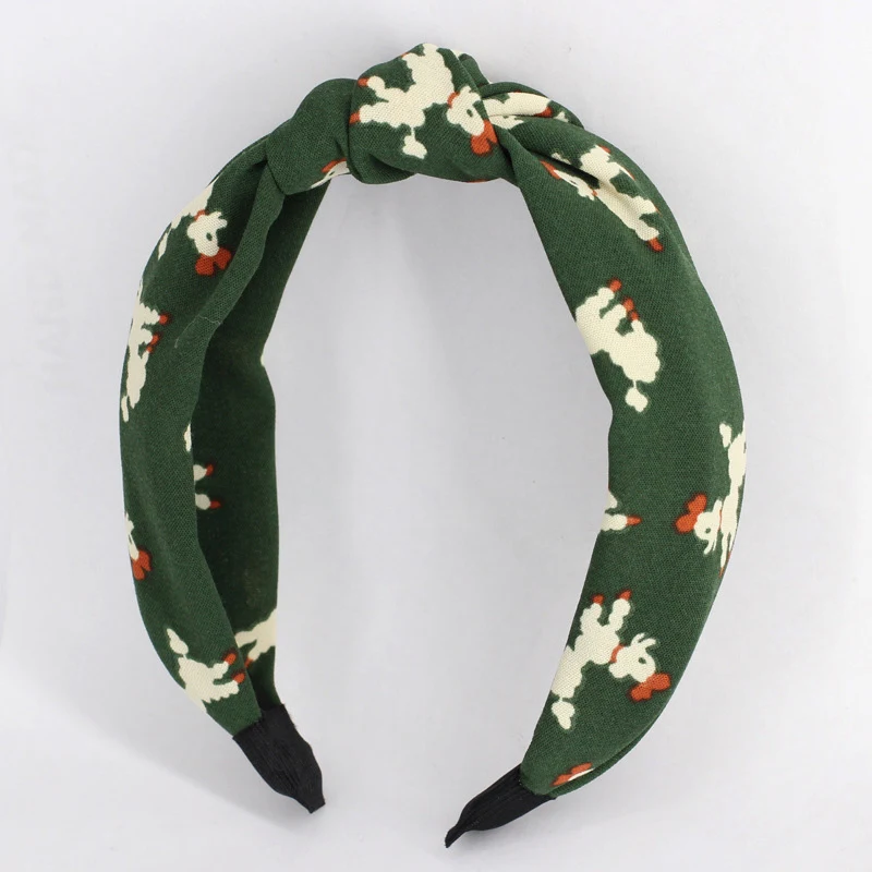 Schattige en zoete grote rode kruisvormige hoofdband met knoop. Perfect voor een modieuze haarstijl en een vleugje charme.
