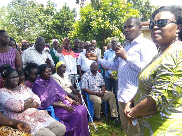 Suba South MP John Mbadi and Kabondo Kasipul MP Eve Obara with the late MP Ken Okoth's mother Angelina Ajwang (in purple) and other family members and relatives Kasewe, Kabondo, on Monday, August 5,2019.