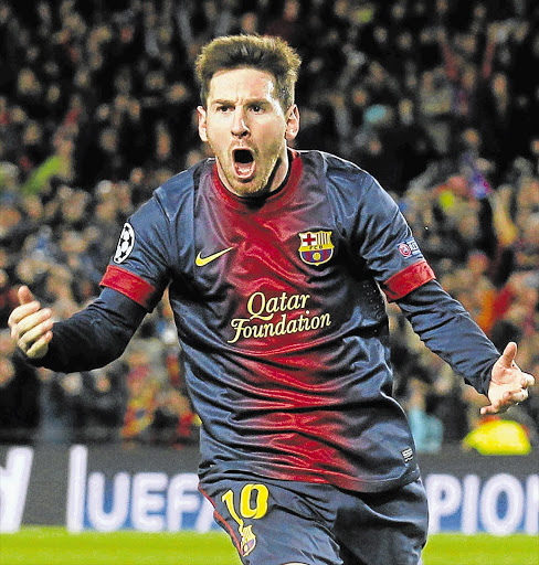 Barcelona's sensational Lionel Messi sparks delirium at the Nou Camp and celebrates after scoring his goal.