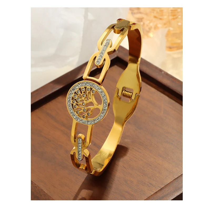 Pulseira Árvore da Vida Feminina vazada Aço Titânio banhada a ouro. Joia delicada e cheia de significado, perfeita para mulheres.