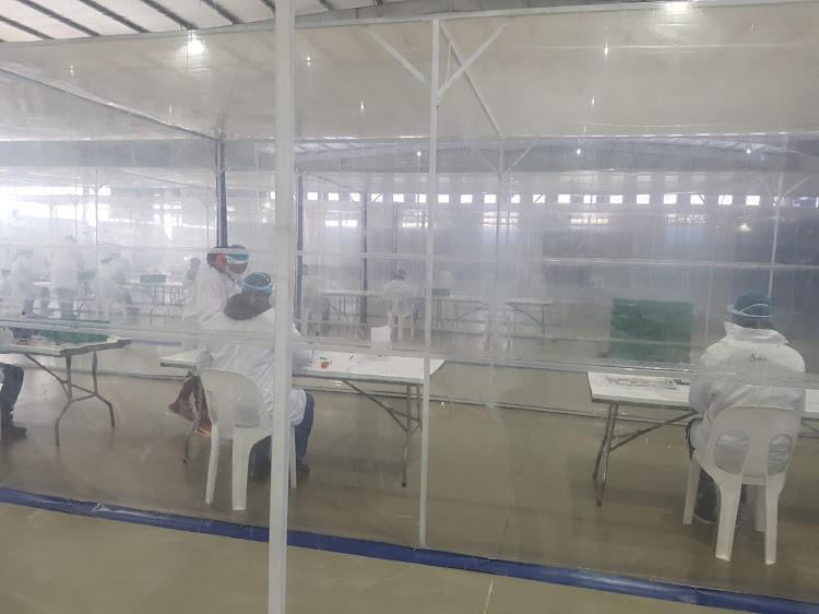 Workers at the SAVE-P ventilator assembly line in Pretoria.