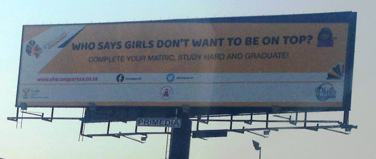 Controversial billboard "Who says girls don’t want to be on top?"