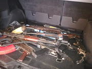 Some of the weapons confiscated by the police from a house in KwaThema, Ekurhuleni, on Monday.