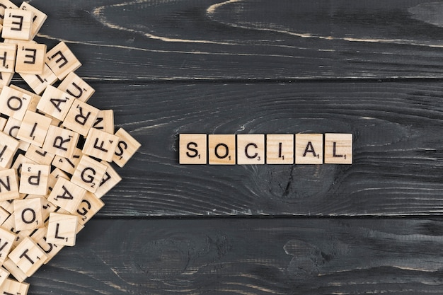 Free photo social word on wooden background