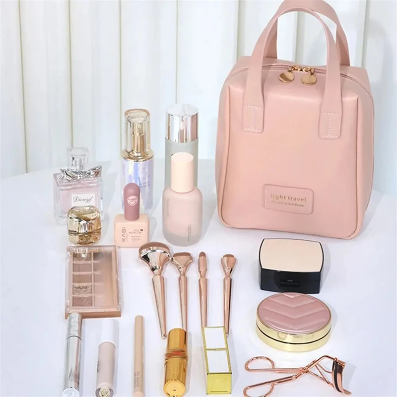 Shellvormige PU lederen cosmetische tas waterdicht met letters Multifunctionele make-up etui handbagage reizen was tas.