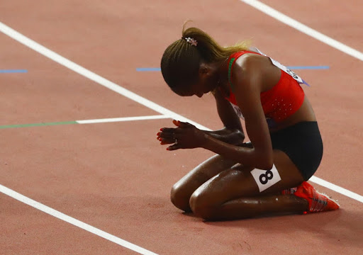 Athletics - World Athletics Championships - Doha 2019 - Women's 3000 Steeplechase Final - Khalifa International Stadium, Doha, Qatar - September 30, 2019. Kenya's Beatrice Chepkoech celebrates winning the race. REUTERS/Ahmed Jadallah