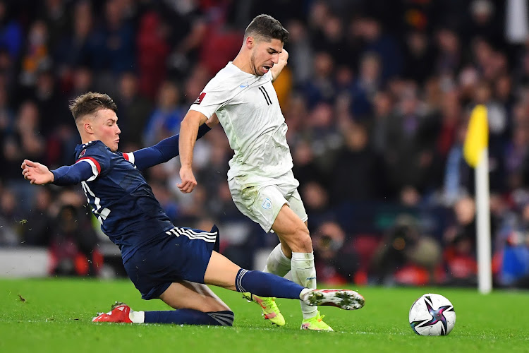 Scotland's striker Nathan Patterson (L) vies with Israel's striker Manor Solomon during the Fifa World Cup Qatar 2022 Group F qualification football matchat Hampden Park in Glasgow on october 9, 2021.