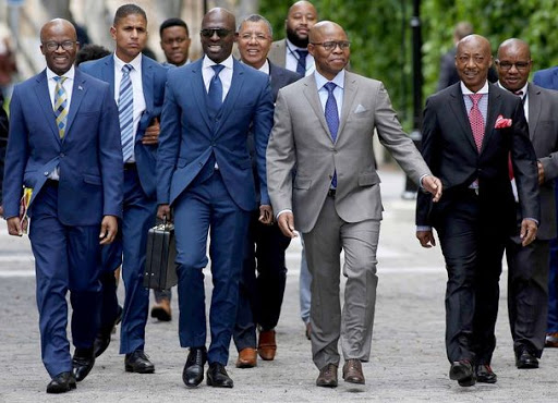 From left to right are National Treasury director general Dondo Mogajane, Finance Minister Malusi Gigaba, Deputy Minister of Finance Sfiso Buthelezi and SARS Commissioner Tom Moyane on their way to the medium-term budget speech of the Finance Minister Malusi Gigaba at parliament in Cape Town . PICTURE: ESA ALEXANDER/THE TIMES