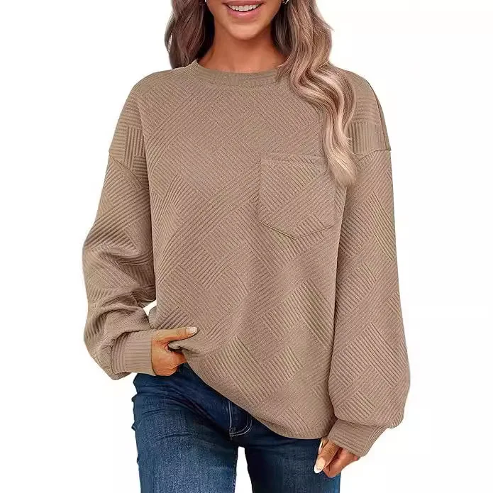 Dames lange mouwen trui met dropped shoulders en ronde hals, textuur voor een stijlvolle look, perfect voor casual outfits en comfort.