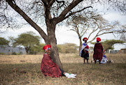 Thulisile Masondo rests  under the tree during the Umkhosi Wesivivane at KwaKhangela Royal Palace