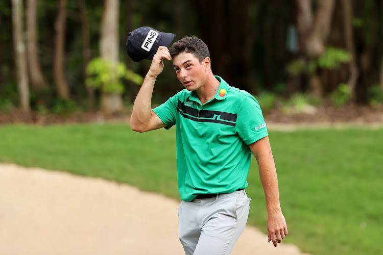 Viktor Hovland of Norway celebrates his birdie on the 18th green to win during the final round of the Mayakoba Golf Classic at El Camaleón Golf Club on December 6, 2020 in Playa del Carmen, Mexico