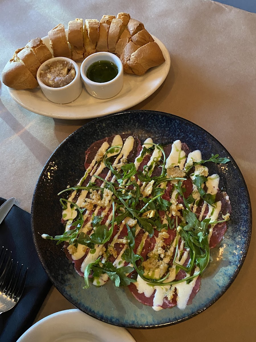 Gluten free bread and beef carpaccio