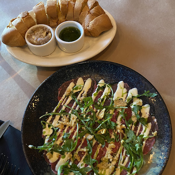 Gluten free bread and beef carpaccio