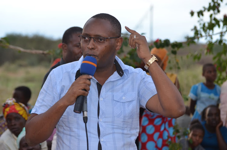 Taita Taveta Governor Granton Samboja addressing mourners in Kirumbi, Sagalla ward, in June.