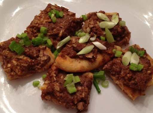 Sirloin and mushroom baked onto soft naanbread.