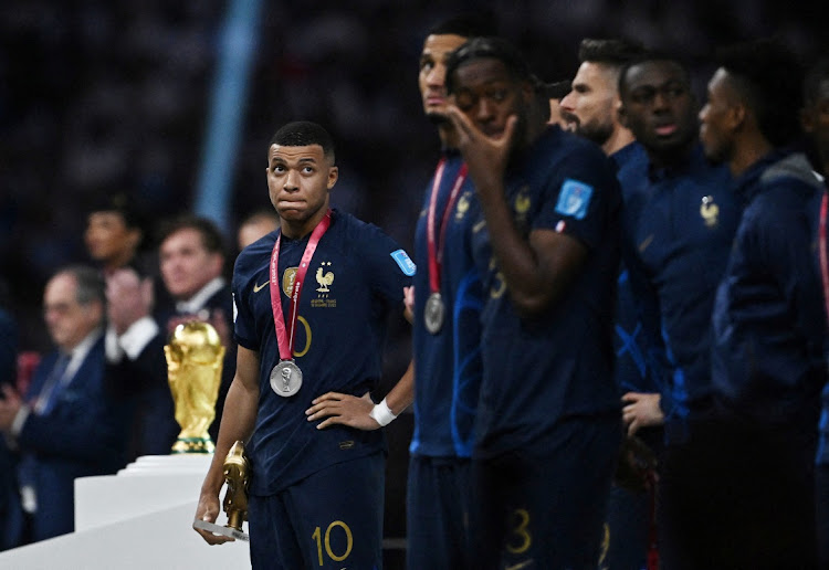 Kylian Mbappe after receiving his runners-up medal and the Golden Boot award after France's World Cup final defeat against Argentina at Lusail Stadiumin Lusail City, Qatar on December 18 2022.