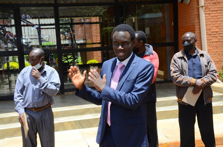 Kinoo MCA Samuel Kimani speaks to some of the integrated IDPs at Kiambu county assembly on March 4, 2022