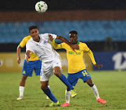 Lesedi Kapinga of Mamelodi Sundowns challenged by Salim Mohamed Bershawi of Al Hilal during the CAF Champions League match between Mamelodi Sundowns and Al Hilal SC on the 13 February 2020 at Loftus Versfeld Stadium.