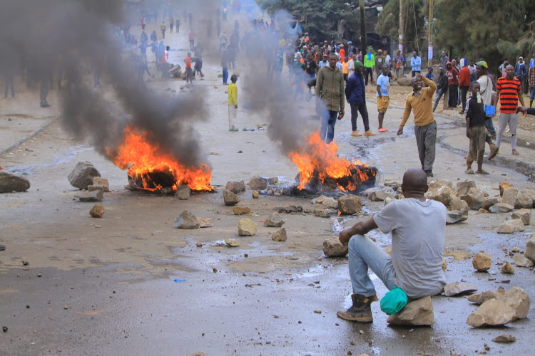 Protestors light fire outside Kamukunji Grounds on July 12, 2023