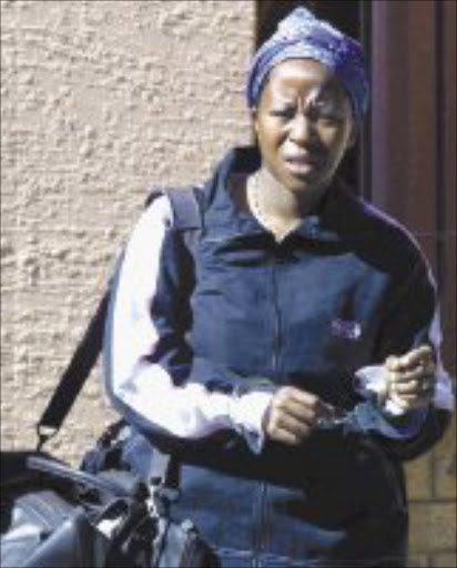 CASE PENDING: Nokwanda Ngombane is awating trial for her husband's murder. Pic. Julian Rademeyer. 22/7/05. © Sunday Times.