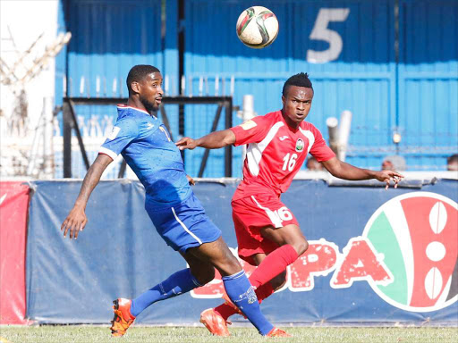 Clifton Miheso (R) of Kenya's Harambee Stars challenges Jeffry Fortes of Blue Sharks of Cape Verde during their World Cup qualifier match at the Nyayo National Stadium Nairobi on 13 November 2015. Kenya won 1-0. Photo/Fredrick Onyango/www.pic-centre.com (KENYA)