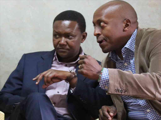 Machakos Governor Alfred Mutua (left) with Tetu MP Ndung’u Gethenji at Aguthi Catholic Church in his Tetu constituency, Nyeri County on Sunday.