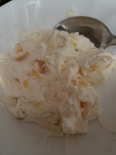 Pineapple fluff with a twist.  I am allergic to vanilla, but love this dessert,  so instead of the vanilla pudding, I used cheesecake pudding.  It was a huge hit with my family! 