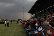 A lightning bolt hits as parents gather for a meeting with Gauteng Education MEC Penaza Lesufi, 17 February 2022, at Hoërskool Jan Viljoen, west of Johannesburg, on Thursday.