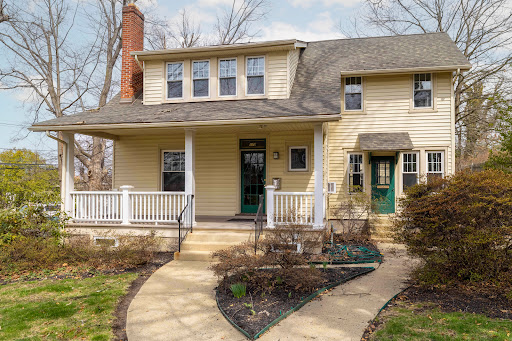 Yellow house with porch and garden - Buy this luxury apartment / penthouse in Doylestown, 3 bedrooms