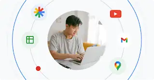 Un hombre joven usa una laptop. Su imagen se presenta dentro de un círculo que muestra logotipos de productos de Google.