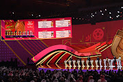 LED displays the Fifa World Cup Qatar 2022 Final Draw results for Groups A, B, C and D during the Final Draw at the Doha Exhibition Center on April 01, 2022 in Doha, Qatar.