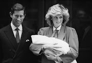 Prince Charles and Diana, Princess of Wales, with their newborn son, Prince Harry, in 1984. Diana died in a car crash in 1997.