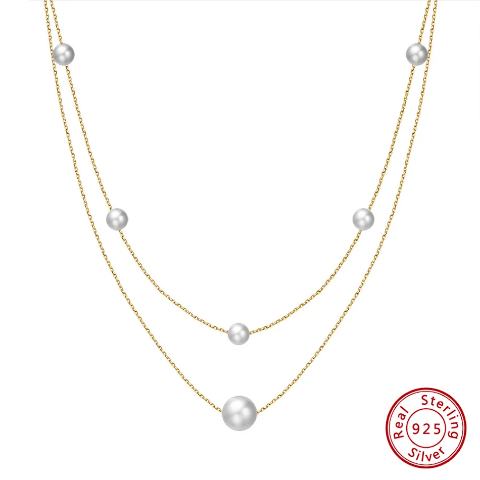 Collier double couche en argent sterling 925, pendentif perle baroque, design original et élégant.