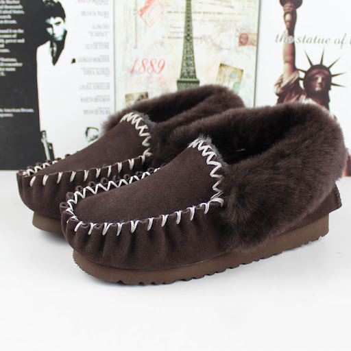 Title 3, Black sheepskin ankle boots with thick, flat bo...