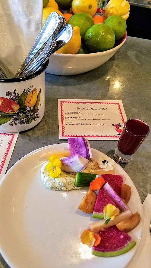 Guests were welcomed to the Kachka Maslenitsa brunchwith a vitamin shot called Triple Sunrise with horseradish vodka, apple juice, beet juice, and celery bitters, and then given a crudite plate with dill butter