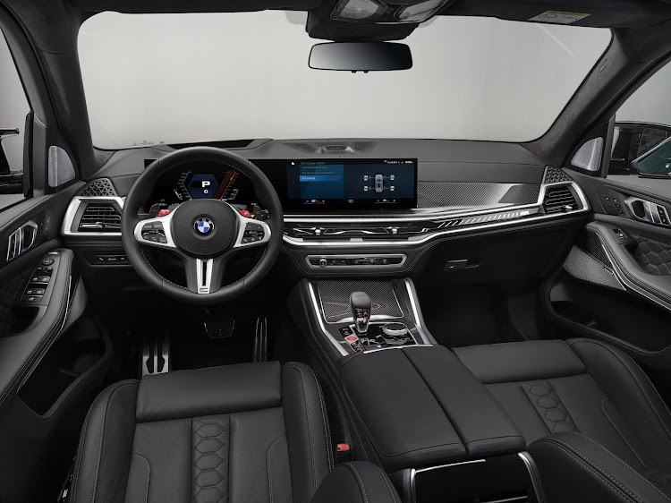The new BMW Curved Display houses an information display and infotainment screen under a single glass surface. Picture: SUPPLIED
