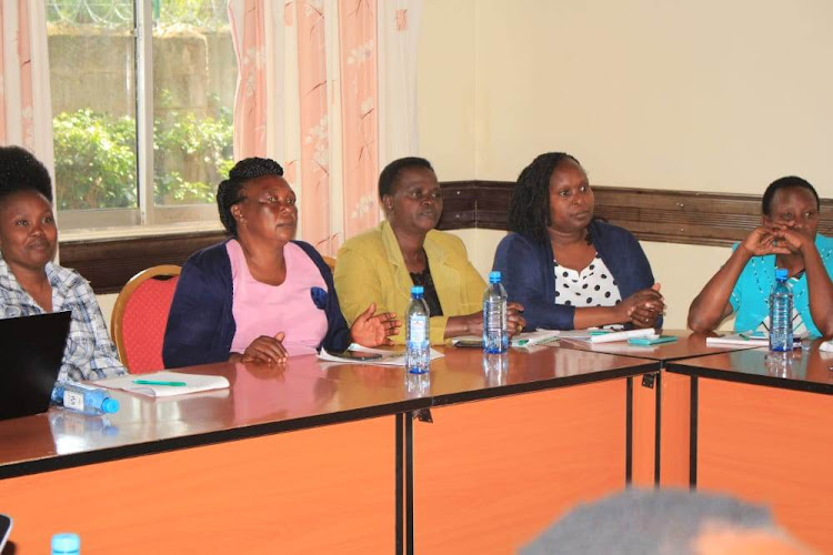 Participants follow proceedings during the workshop at a Nairobi hotel on Monday