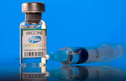 Pfizer-BioNTech says three doses of its Covid-19 vaccine work against the new Omicron variant, while two doses is less effective.