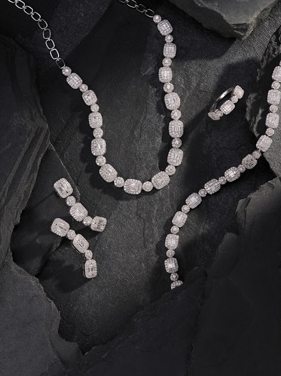 Art Deco Decadence designs from the American Swiss 2022 Masterpieces collection: white gold 2.5ct diamond Art drop earrings, R150,000, white gold 7ct diamond necklace, R440,000, and white gold 4ct diamond bracelet, R300,000.