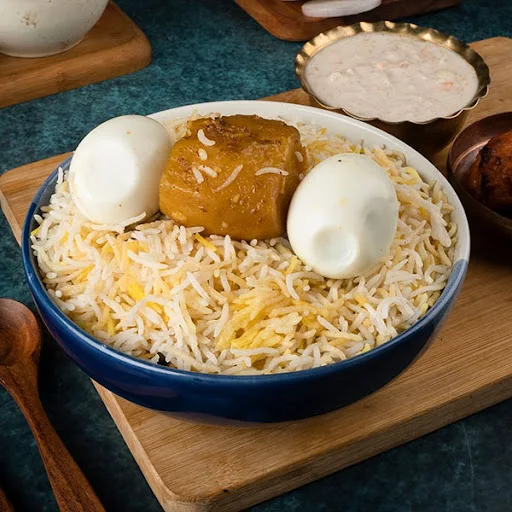 Egg Biryani With Raita + Tikka Kebab