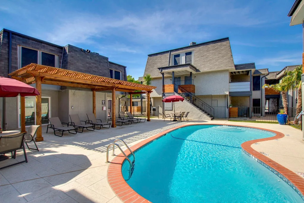 Pool with apartment buildings in the background