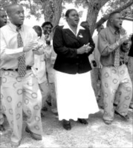 TIME OUT:The mayor of Madibeng Sophie Molokoane-Machika, centre, and local businessmen organised the party, which was attended by thousands of prisoners. Pic. Andrew Hlongwane. © Sowetan.