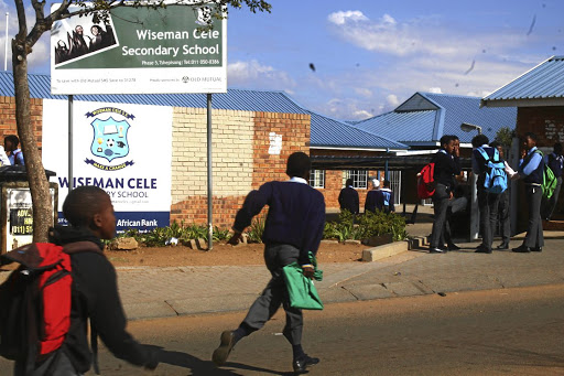 Pupils at Wiseman Cele Secondary in Tshepisong, Roodepoort, left the troubled school at noon yesterday after teachers did not arrive for work, fearing drug gangsters. /KABELO MOKOENA