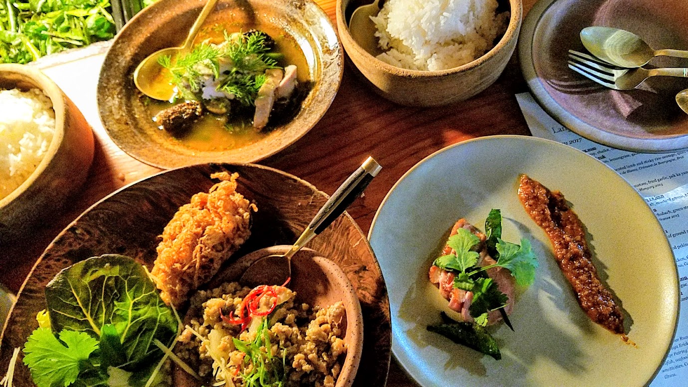 Journey of a Dinner at LangBaan with their May 2017 Tour of Thailand menu: The main course came as multiple dishes all at once to eat family style that included wraps, dish to eat with rice, soup.