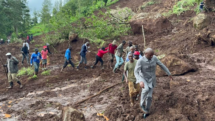 Murang'a governor IrungunKang'ata visiting the site of a landslide that swept four farms and killed six people in Mathioya on April 29, 2024.