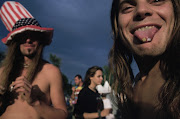 LSD tabs on the tip of young man’s tongue at Woodstock ’94 in Saugerties, New York.