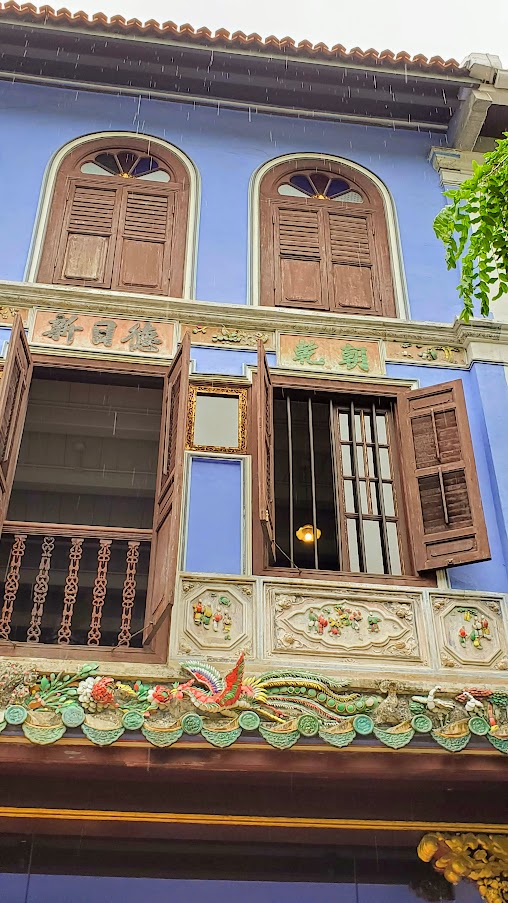 Peranakan Style Buildings in Singapore, Baba  House on Neil Street - a unique opportunity to tour a Peranakan home managed by the National University of Singapore. Tours are limited to once a day and small groups based on what the original building floors can hold, so book your reservation for a tour early